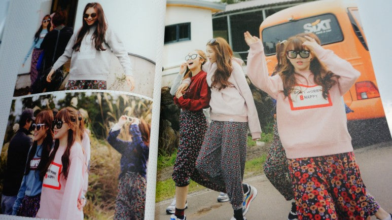 A beautifully packaged GFRIEND 2-DVD set with an exclusive photobook filled with candid moments and group highlights.