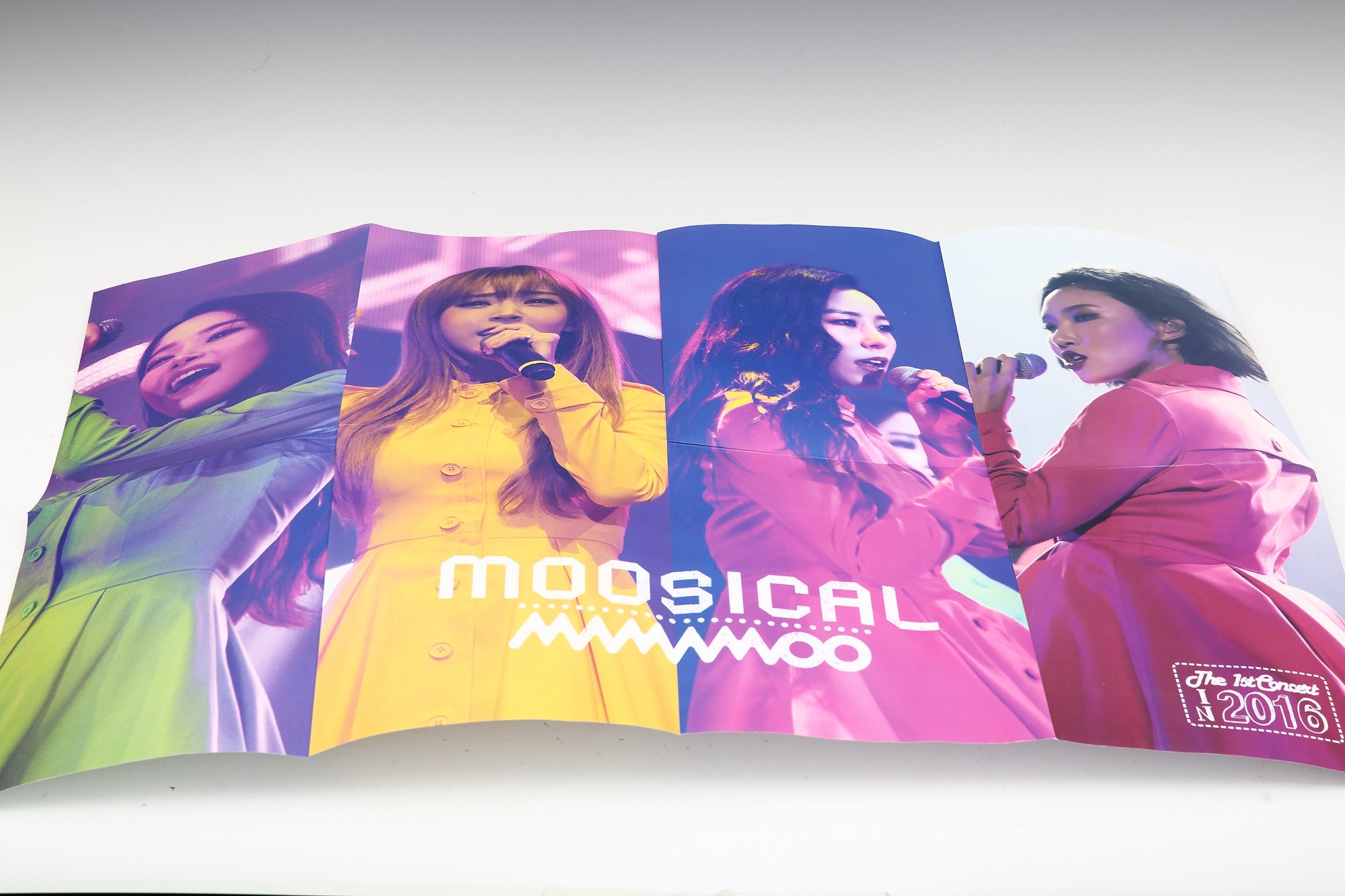 Mamamoo's 1st Concert 2016 Official Photobook & DVD, capturing memorable moments from their live concert with high-quality images and special video content.