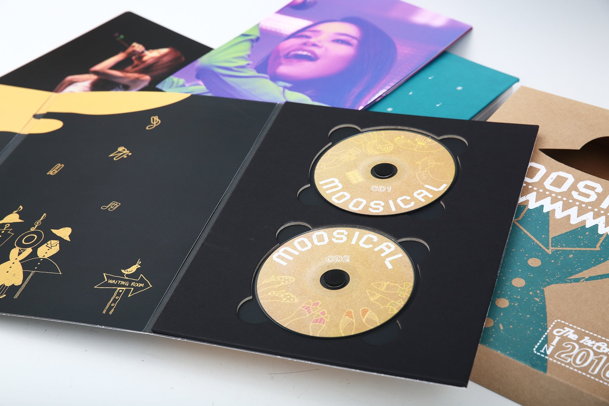 Relive Mamamoo's electrifying 1st concert with this stunning photobook and DVD set, perfect for K-pop fans and collectors.
