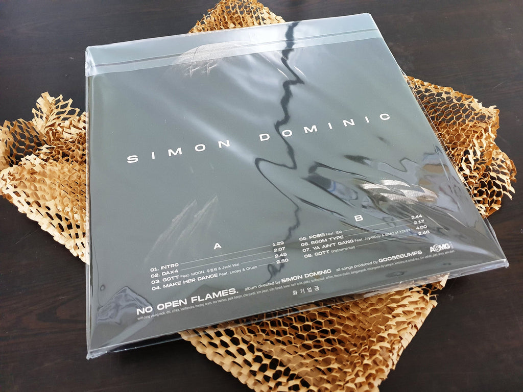 'No Open Flames' LP by Simon Dominic. A rare, unopened piece that every K-pop fan will appreciate. Grab it before it’s gone!